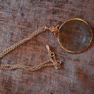 vintage avon magnifying glass necklace